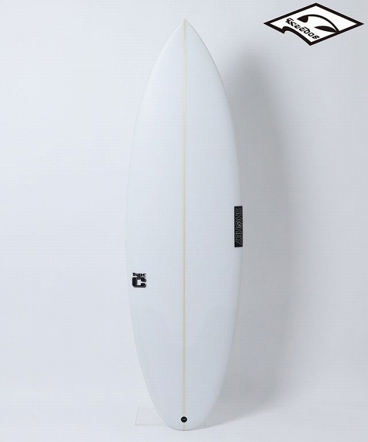 b-_ySRV9fQ - SHOP NEWS | ムラサキスポーツオンラインストア 通販 White shortboard surfboard standing upright on a white background, with a light brown stringer and small black logos near the tail and middle.