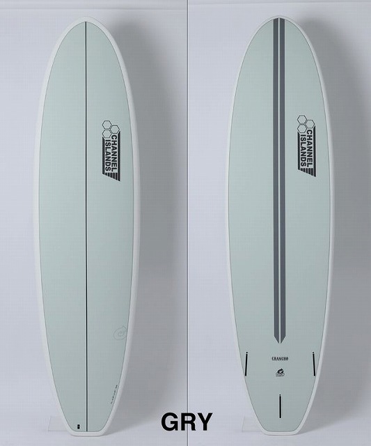 b-Na2bEI7A - SHOP NEWS | ムラサキスポーツオンラインストア 通販 Side-by-side photos of a gray Channel Islands GRY surfboard; left shows the plain deck, right shows the deck with a dark center stripe and logo.