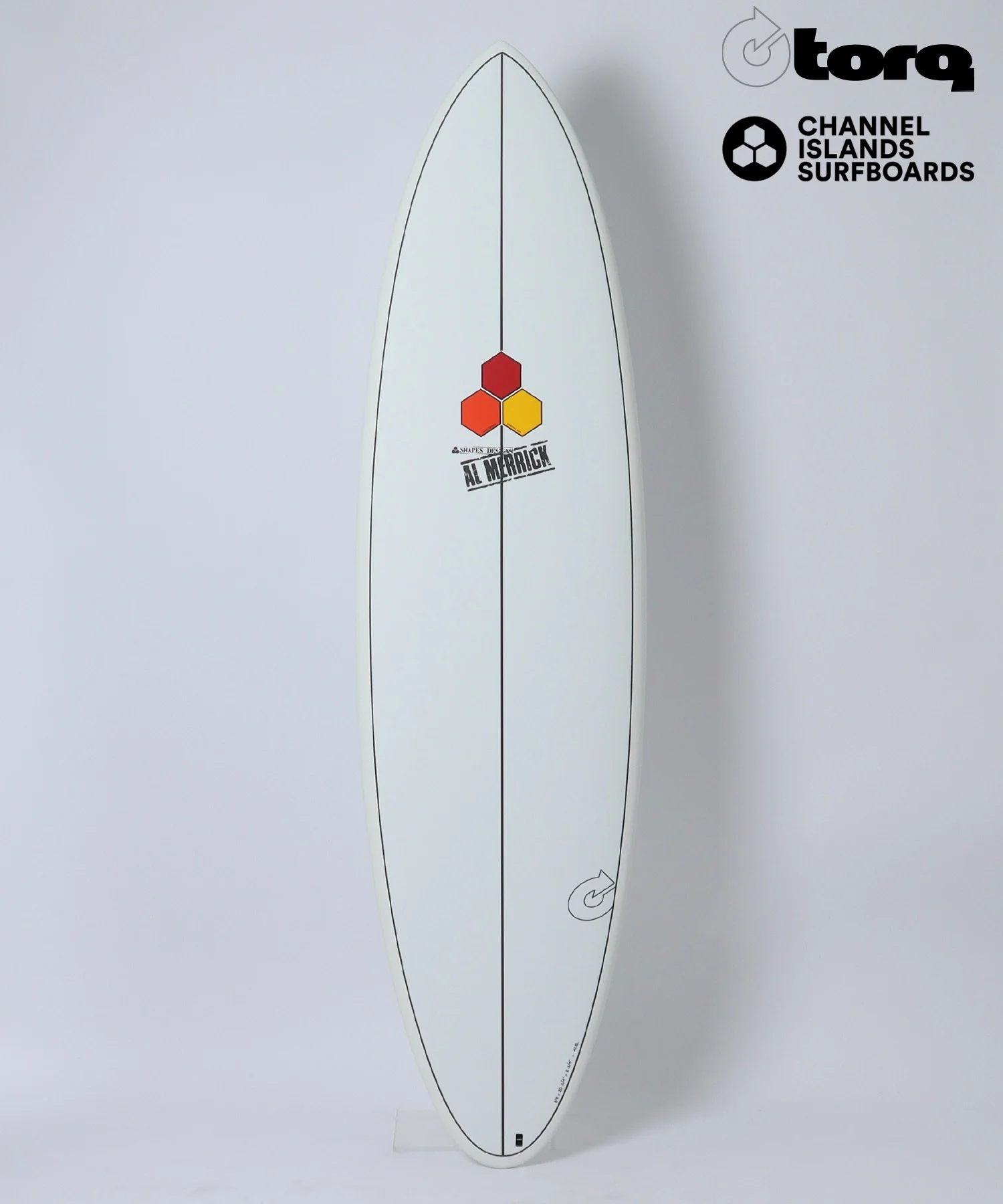 image - SHOP NEWS | ムラサキスポーツオンラインストア 通販 White surfboard standing upright with black narrowing stringers and three hexagon logos in red, orange, yellow near the center; brand logos in the top right corner (Torq, Channel Islands Surfboards).