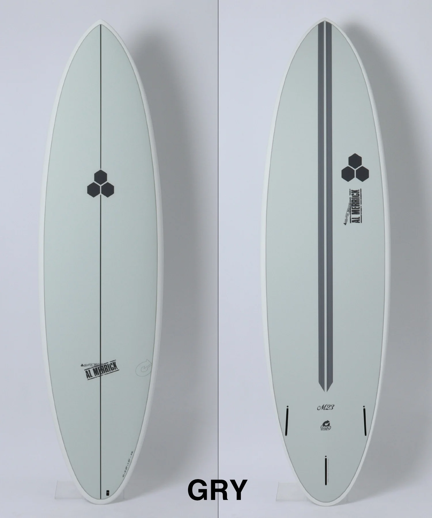 image - SHOP NEWS | ムラサキスポーツオンラインストア 通販 Double-view of a gray surfboard from front and back, with a black hexagon logo along the center stringer.